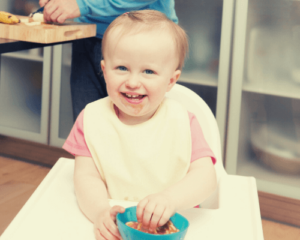 babygirl in highchair