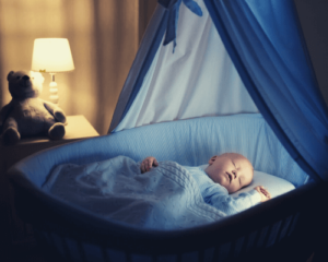 baby sleeping in bassinet