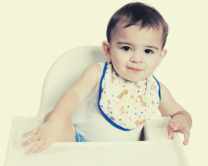 babyboy in highchair